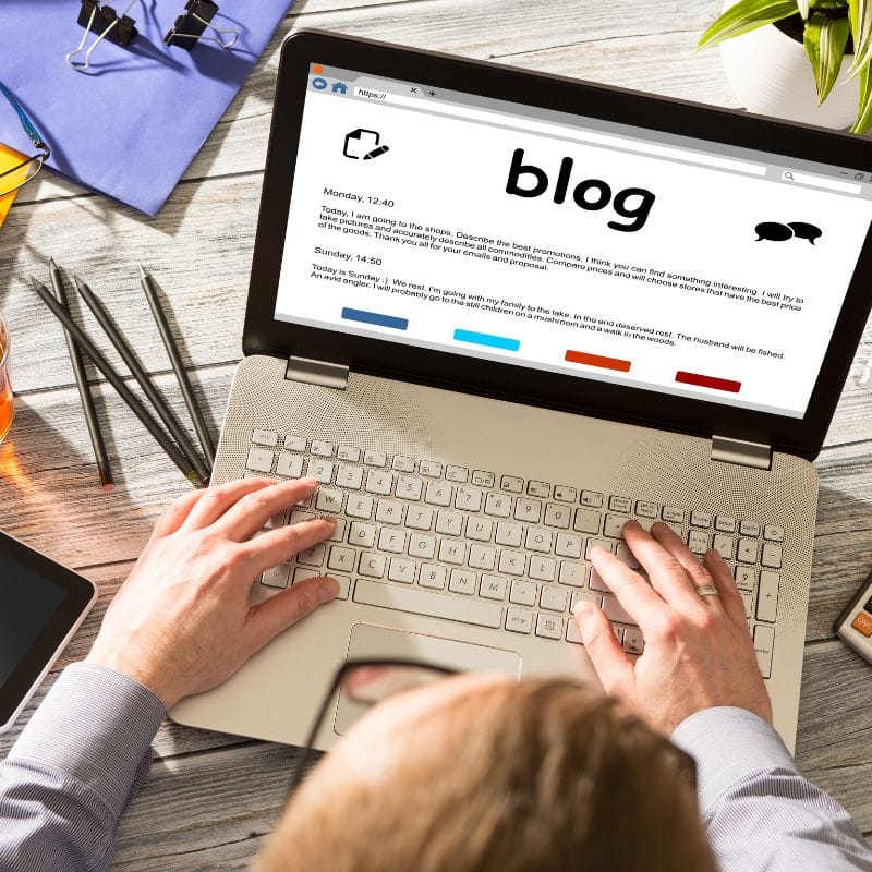 Laptop showing the word blog on the screen